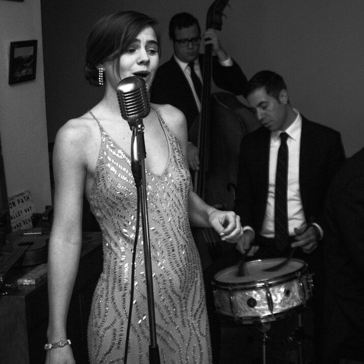 a headshot of Vocalist Sarah King for their performance at the django
