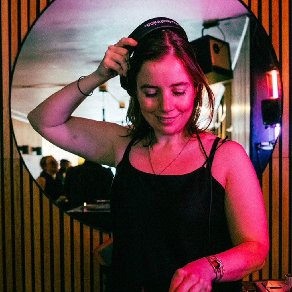 DJ Pepperazzi Spinning Vinyl wearing Headset