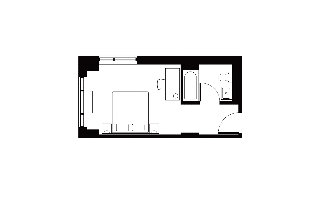 Black and white floor plan of a Deluxe Corner room at Soho Grand Hotel.