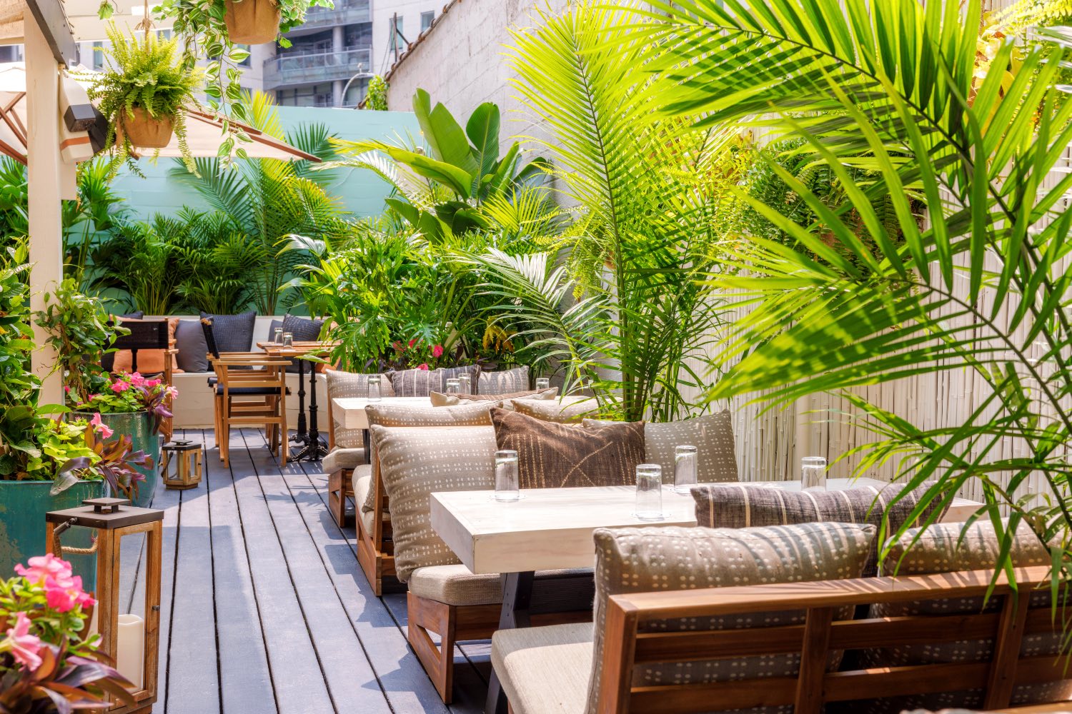 Low table and lounge seating at Gilligan's outdoor restaurant and bar in SoHo, NY.
