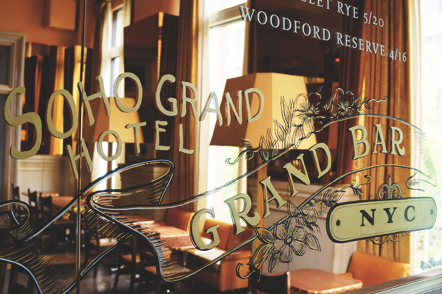 The painted mirror wall at the Grand Bar.