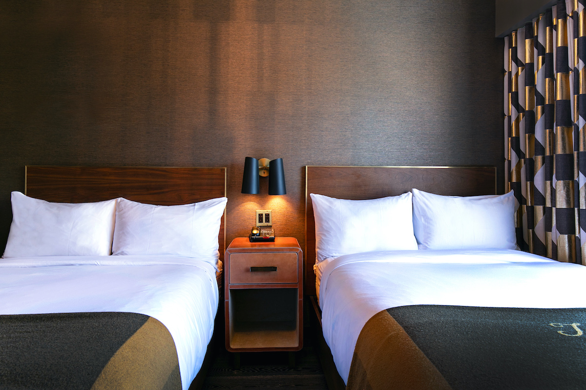 Deluxe Suite second bedroom with double beds