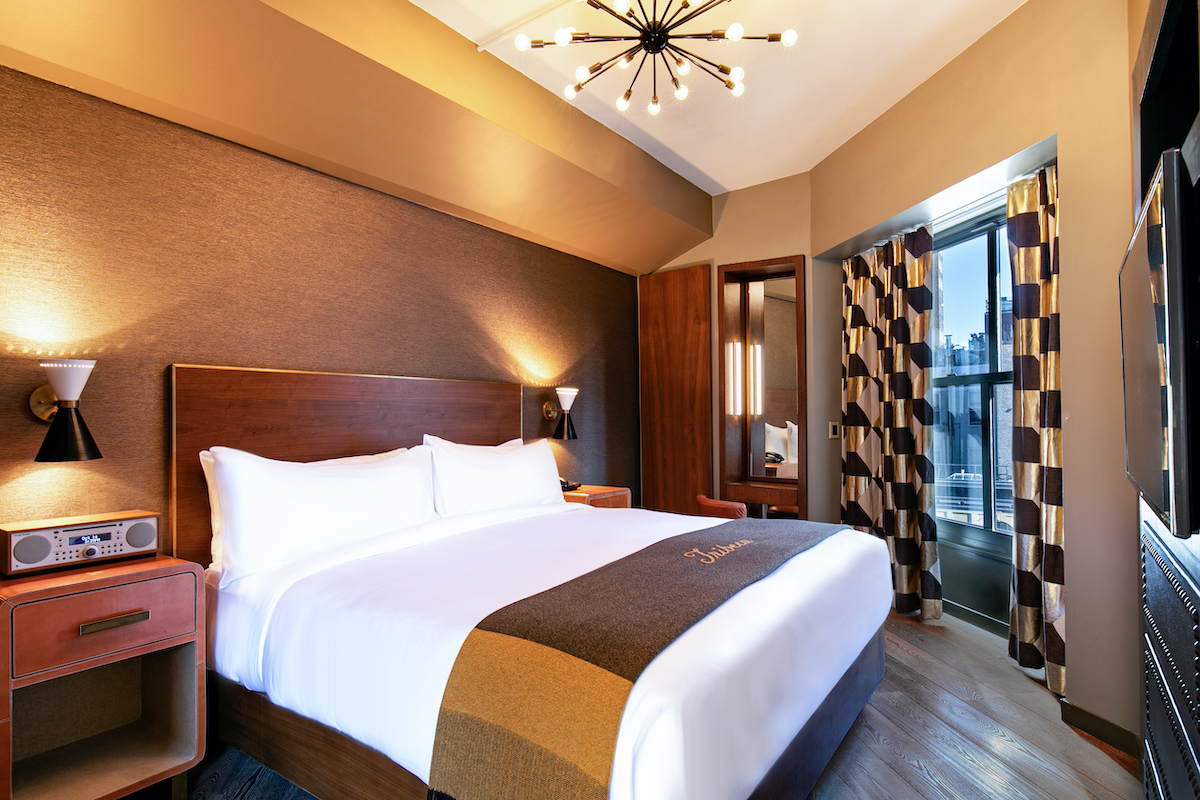 Deluxe Suite master bedroom with a king size bed