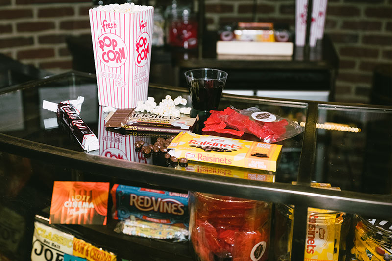 the refreshment case in the Roxy Cinema lobby with popcorn and boxes of candy