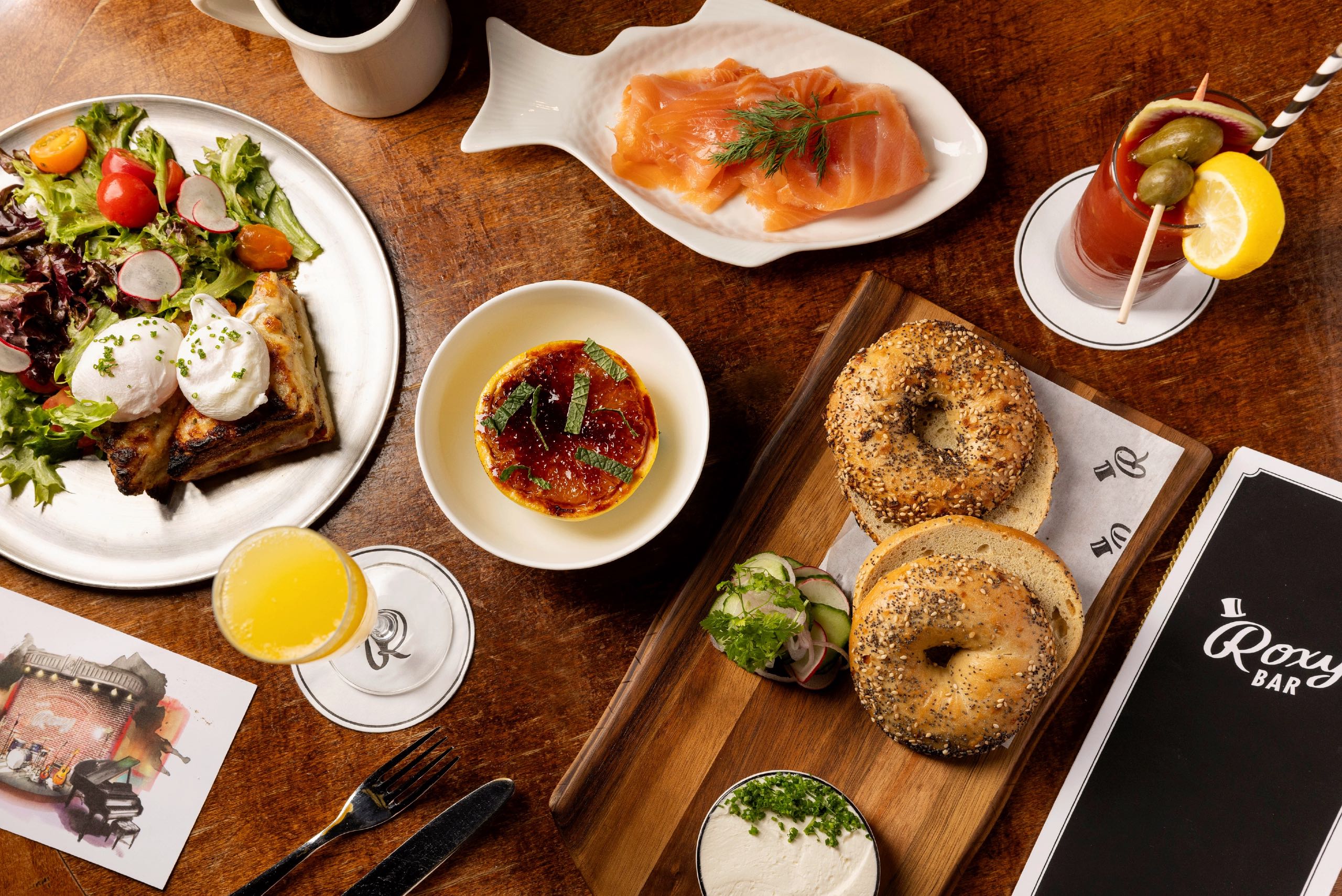 Assortment of brunch entrees, sides and cocktails at Roxy Bar.