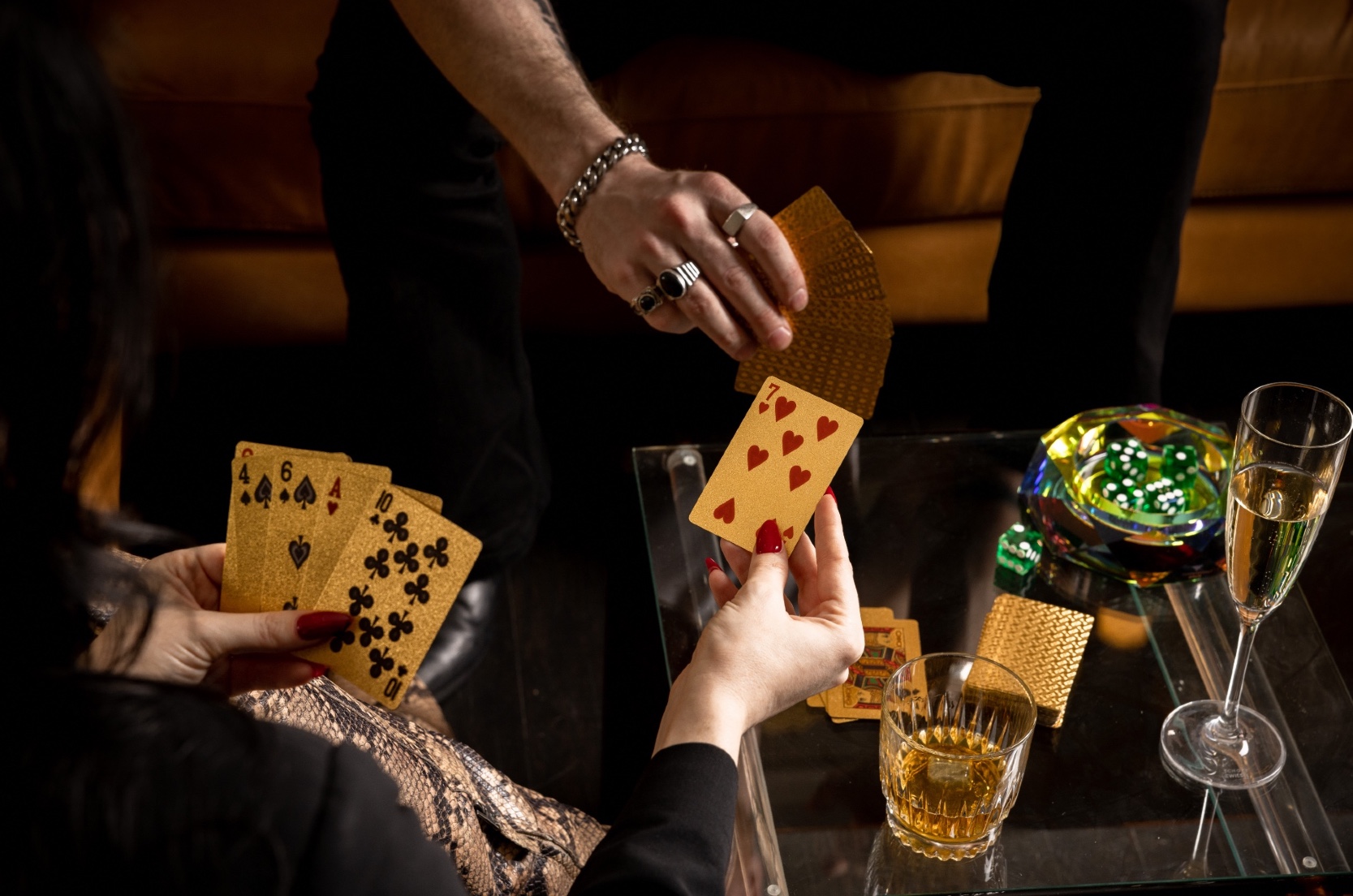 Two people playing a game of cards.