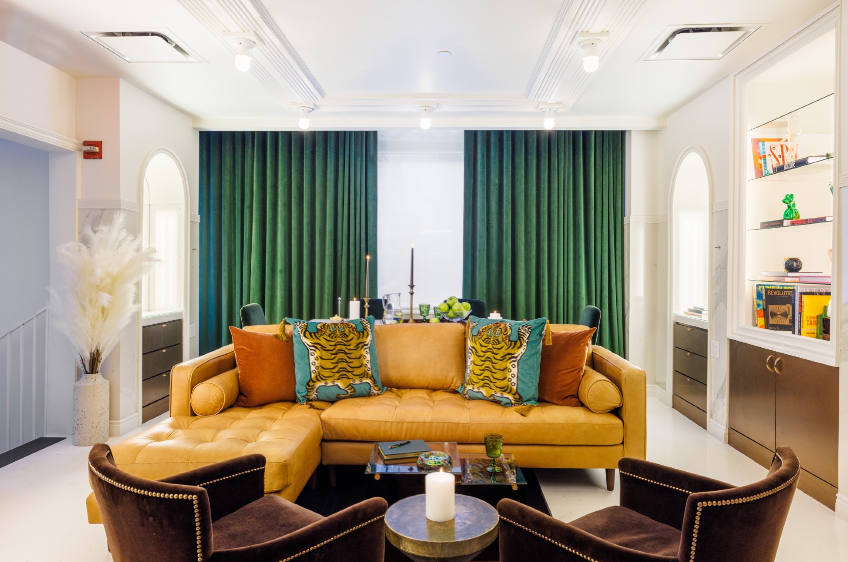 Green Room meeting space at Roxy Hotel with lounge set up and open green window curtains.