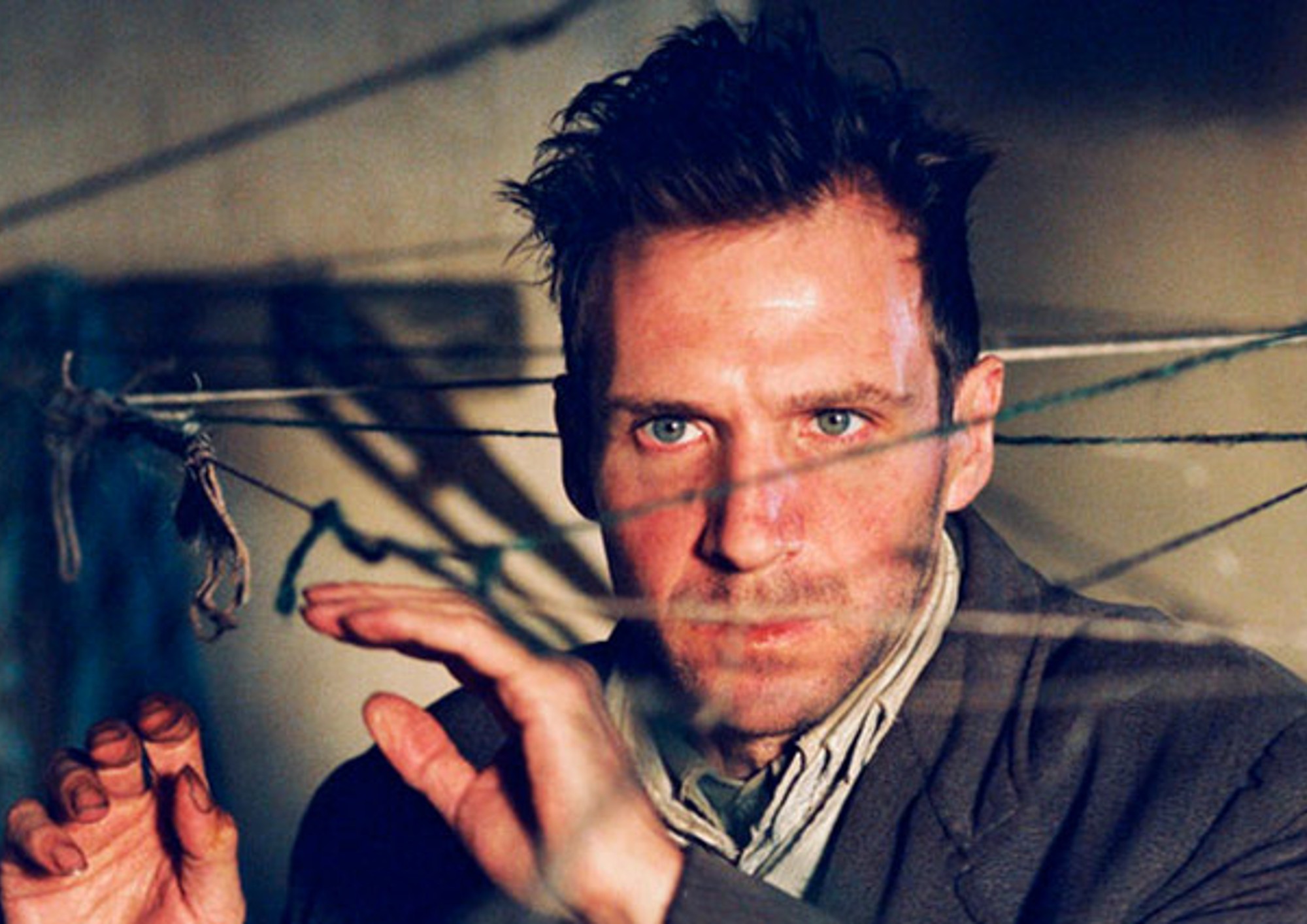 Scene from the motion picture Spider. Closeup of actor Ralph Fiennes.