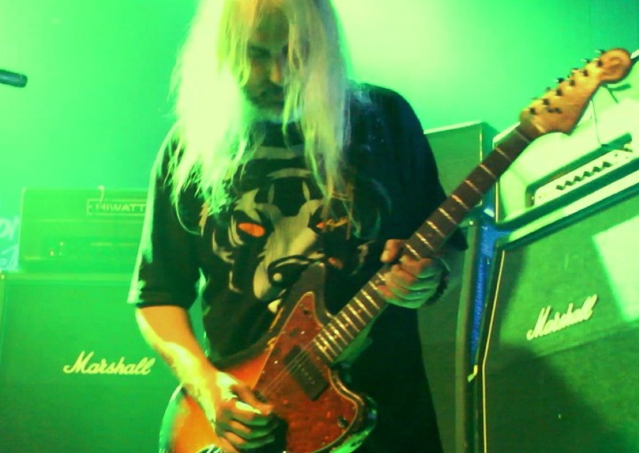 J. Mascis playing guitar
