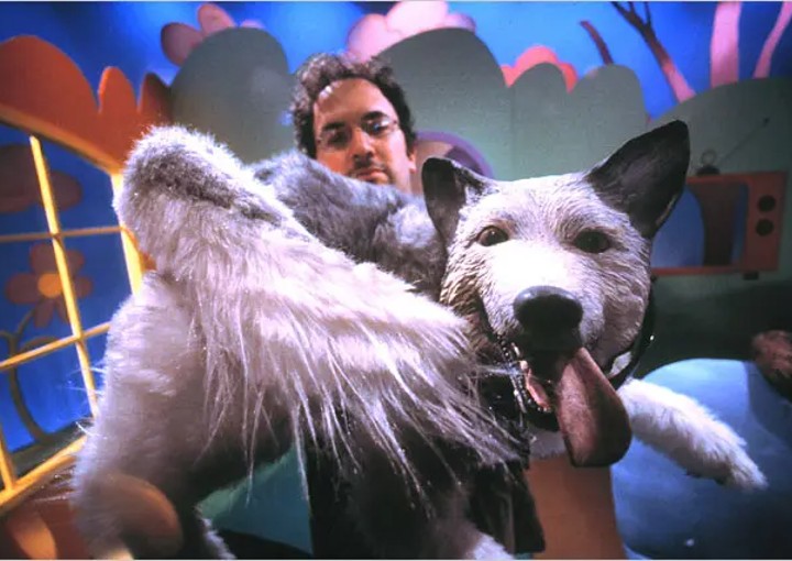 Image of comedian Robert Smigel with dog puppet